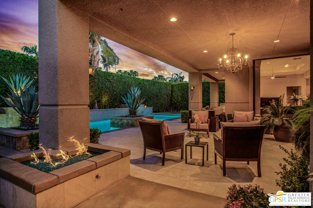 39700 Keenan Drive Rancho Mirage, CA 92270 - Photo 9 of 69 a view of a dining room with furniture and chandelier