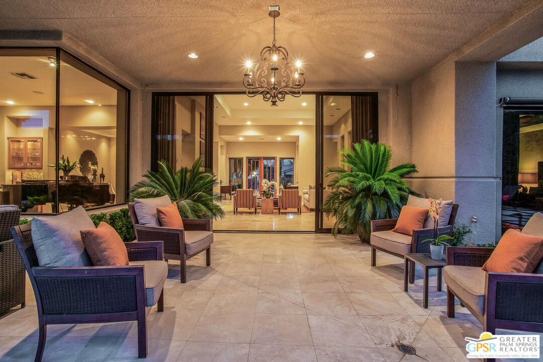 39700 Keenan Drive Rancho Mirage, CA 92270 - Photo 10 of 69 a living room with furniture and a chandelier