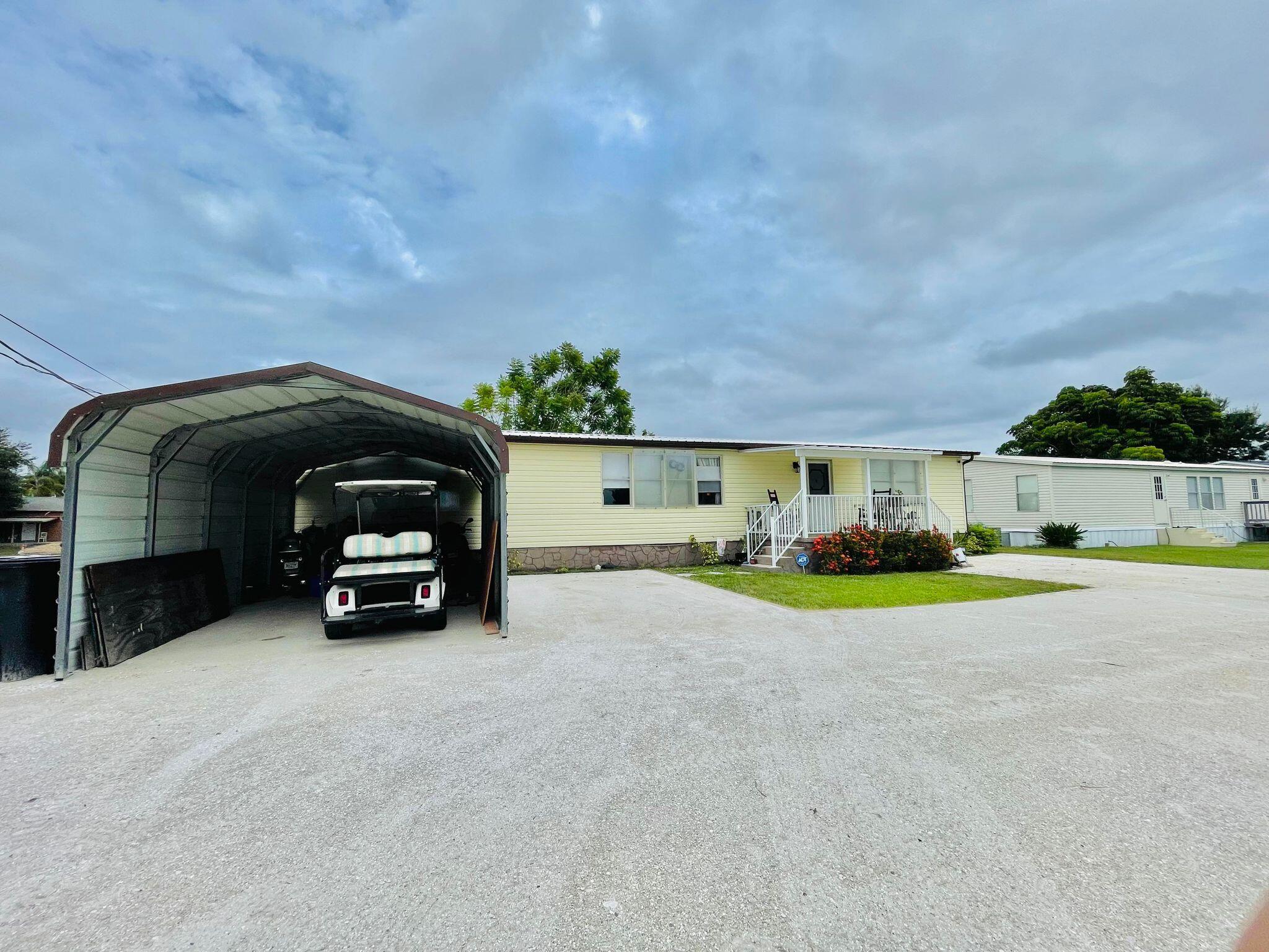 2301 Southeast 33rd Street Okeechobee, FL 34974 - Photo 2 of 29 441958657_482983390847711_88807723169084