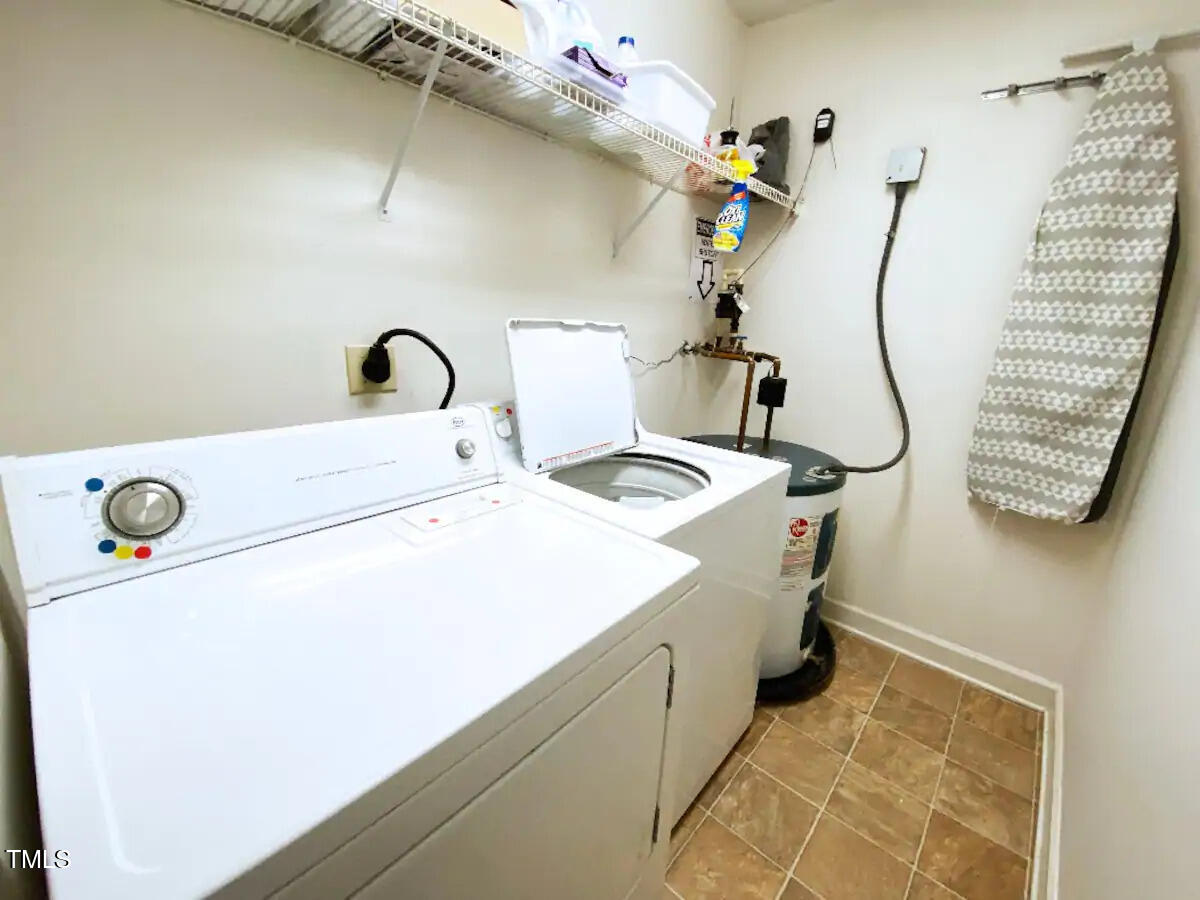 303 Smith Level Road, Unit E33 Chapel Hill, NC 27516 - Photo 16 of 25 a utility room with dryer and washer