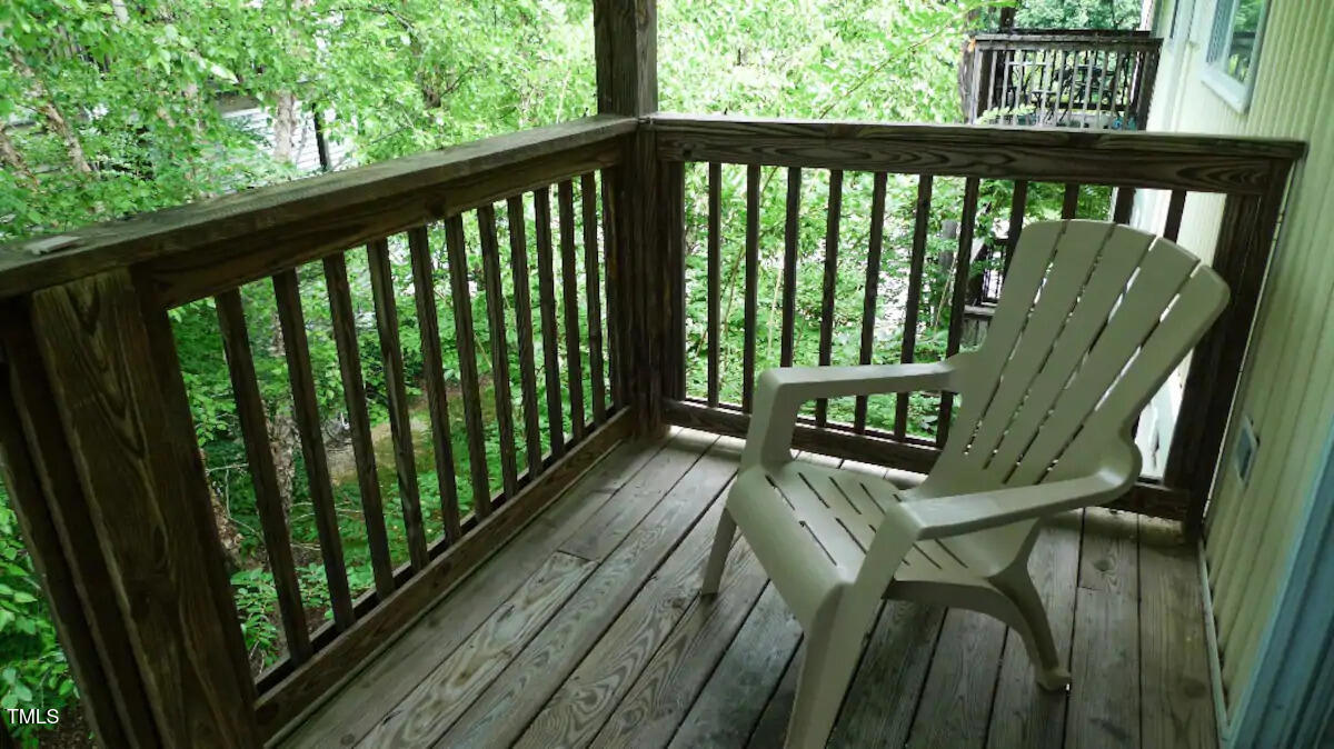303 Smith Level Road, Unit E33 Chapel Hill, NC 27516 - Photo 18 of 25 a view of balcony with wooden floor