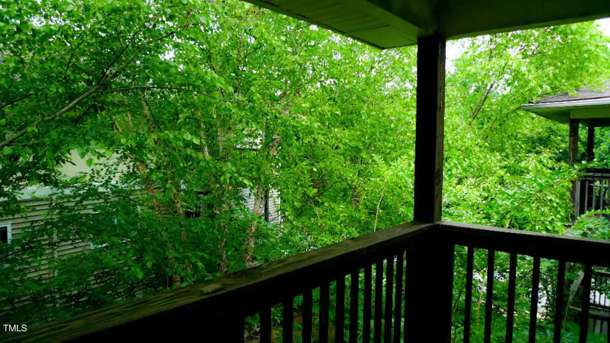 303 Smith Level Road, Unit E33 Chapel Hill, NC 27516 - Photo 19 of 25 a view of a garden from a balcony