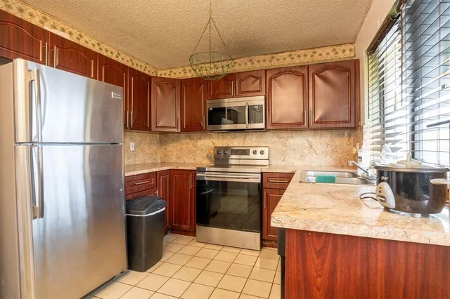 $258,000 | 550 Northwest 214th Street, Unit 201, Miami Gardens, FL 33169