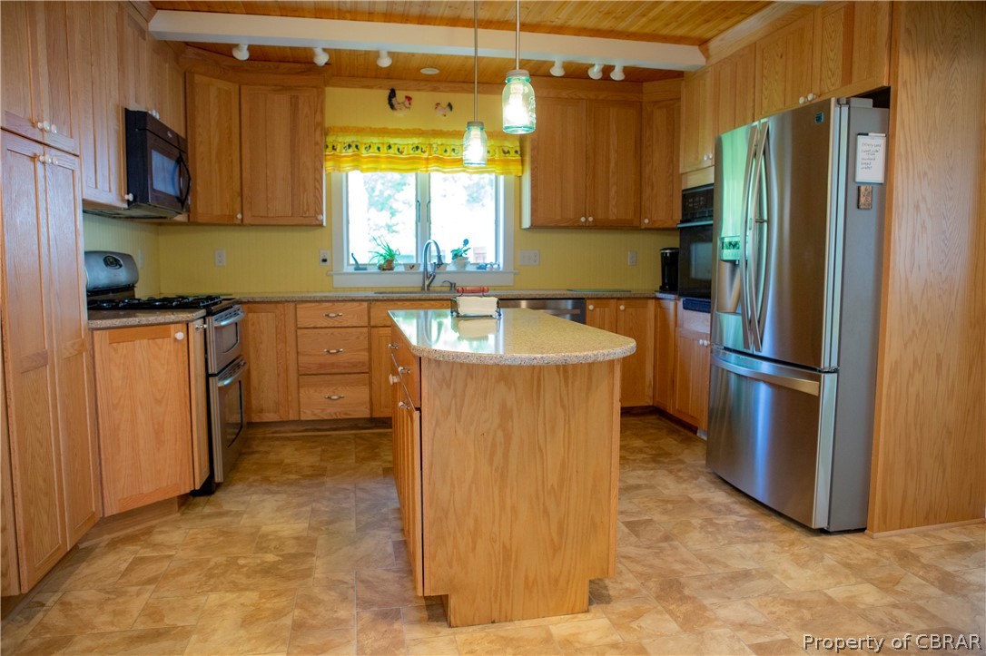 8669 Guinea Road Hayes, VA 23072 - Photo 23 of 49 Spacious Kitchen with an abundance of cabinetry