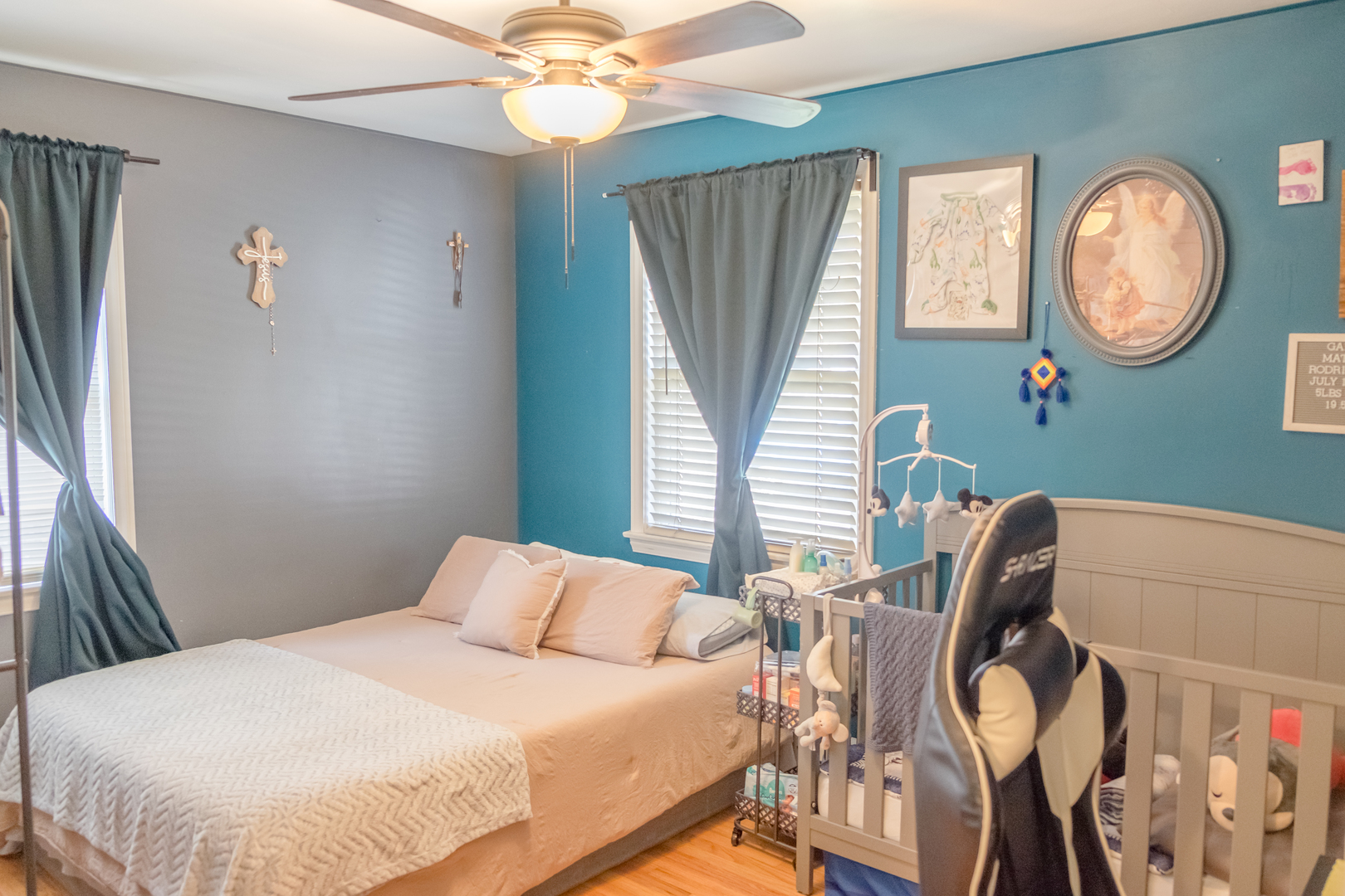 4619 Butterfield Road Hillside, IL 60162 - Photo 15 of 52 a bedroom with a bed and a chandelier