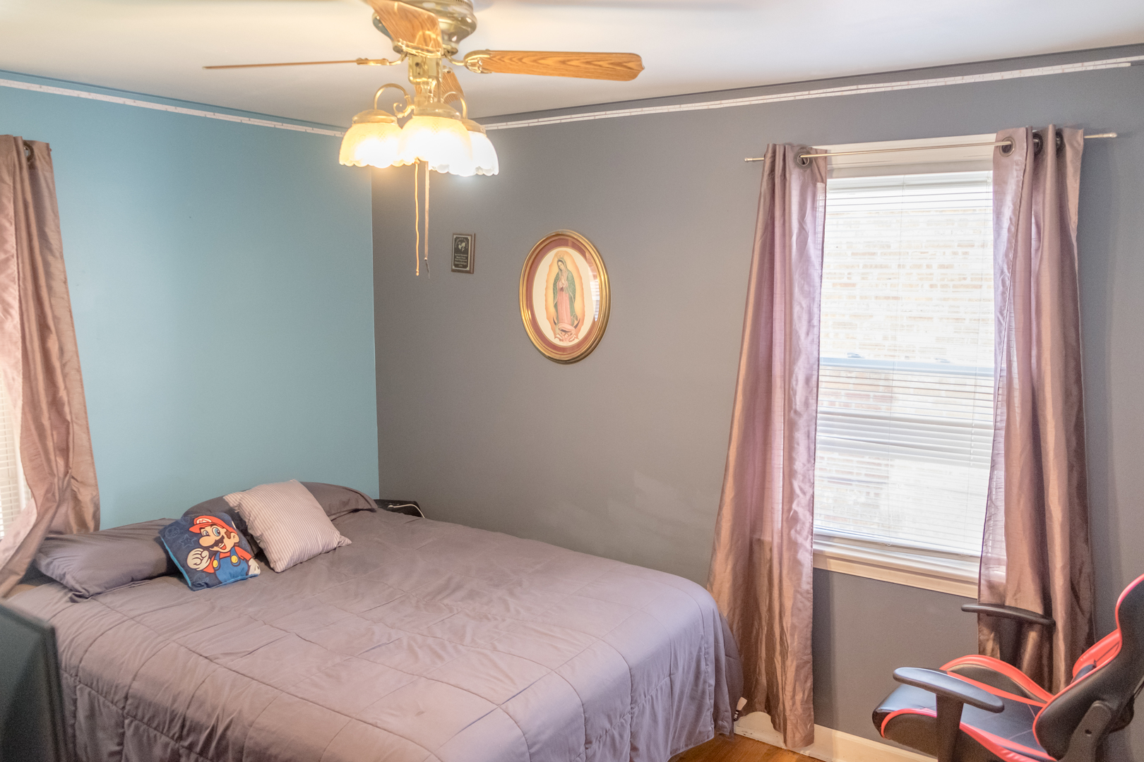 4619 Butterfield Road Hillside, IL 60162 - Photo 19 of 52 a bedroom with a bed and a window