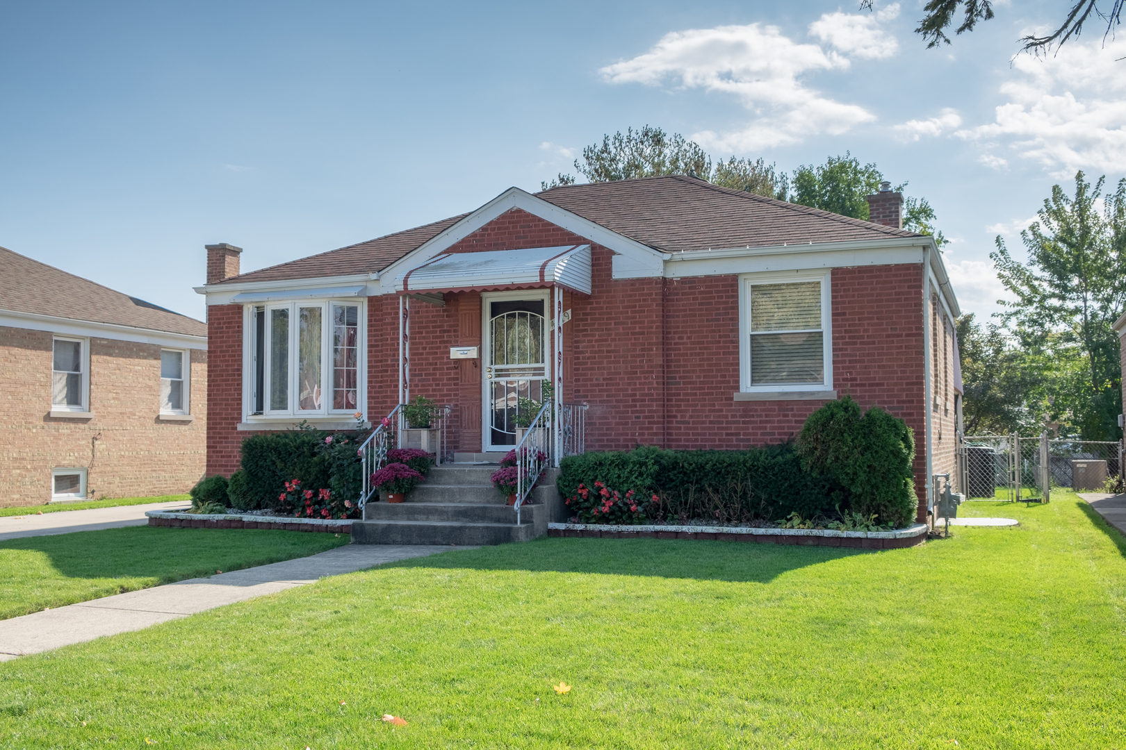 4619 Butterfield Road Hillside, IL 60162 - Photo 3 of 52 a front view of a house with a yard