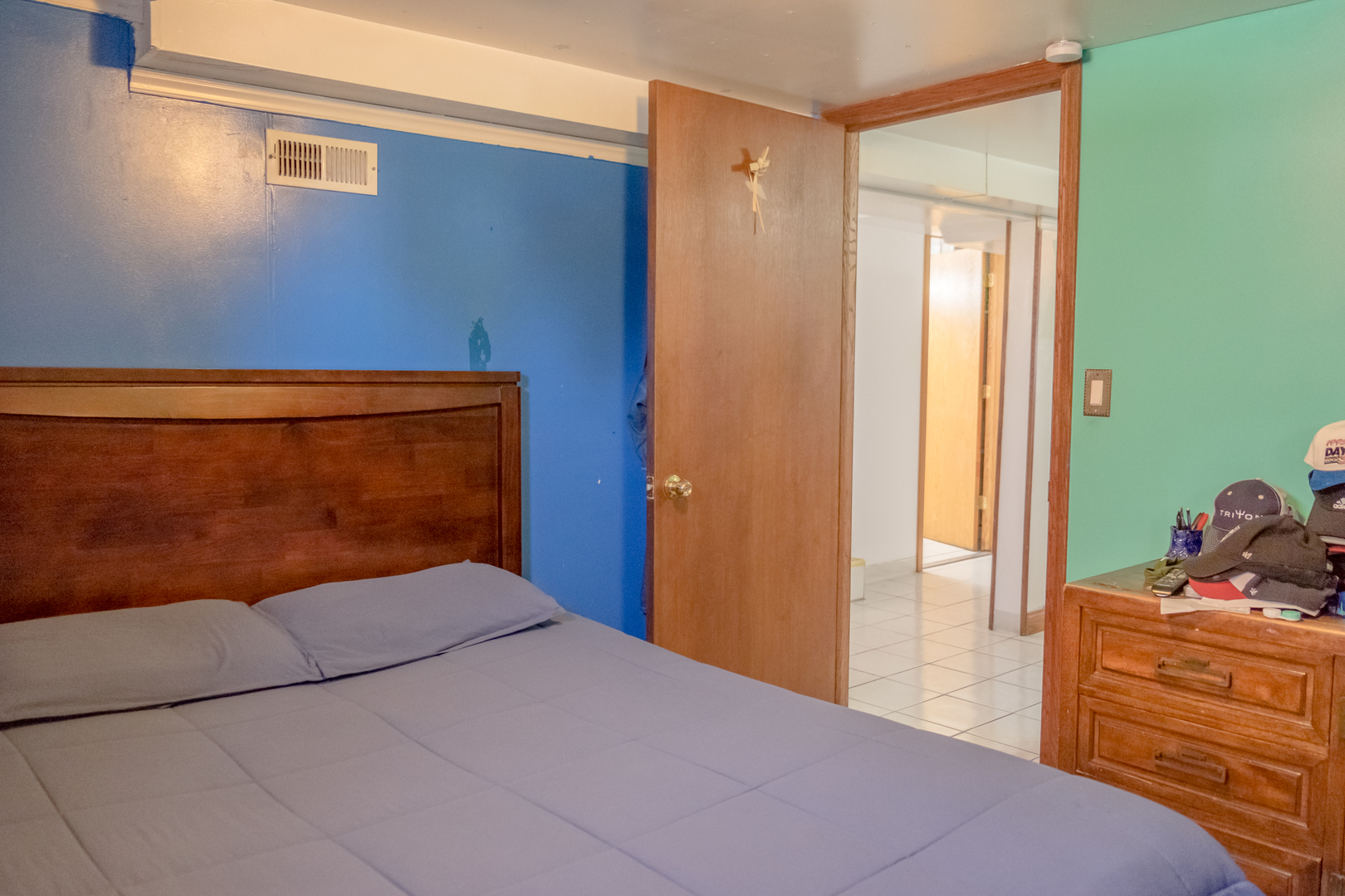 4619 Butterfield Road Hillside, IL 60162 - Photo 36 of 52 a bedroom with a bed and wooden floor