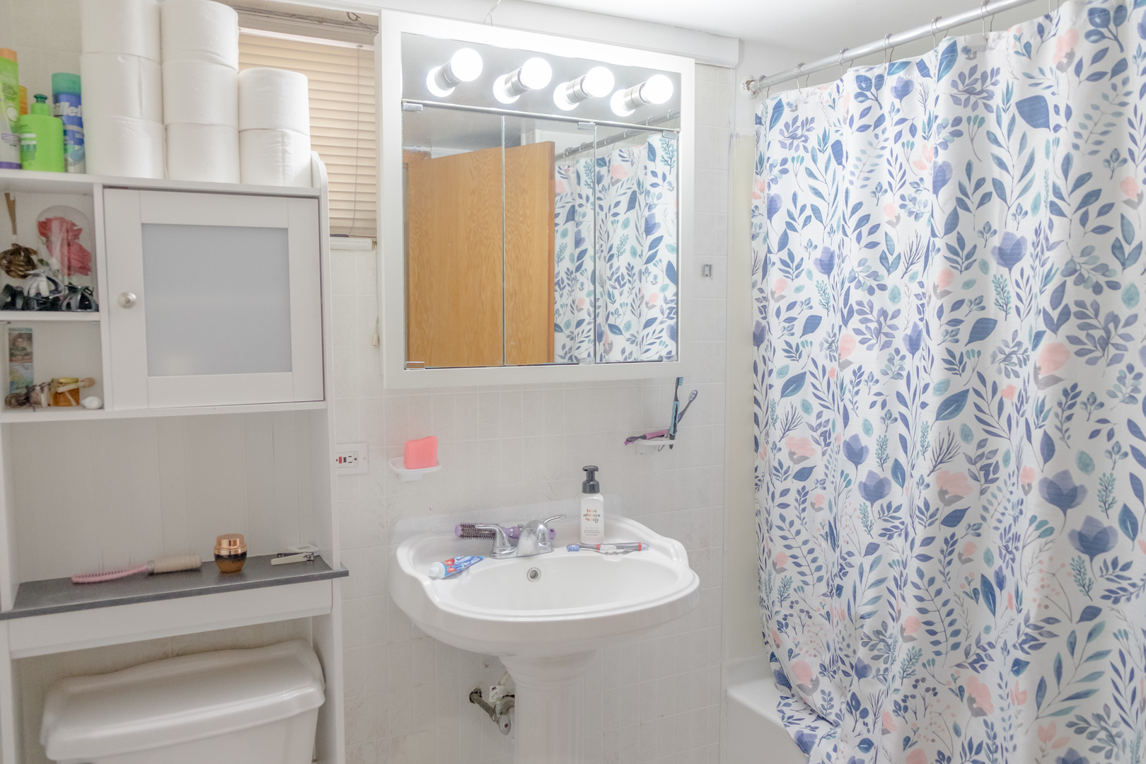 4619 Butterfield Road Hillside, IL 60162 - Photo 39 of 52 a bathroom with a sink toilet and mirror