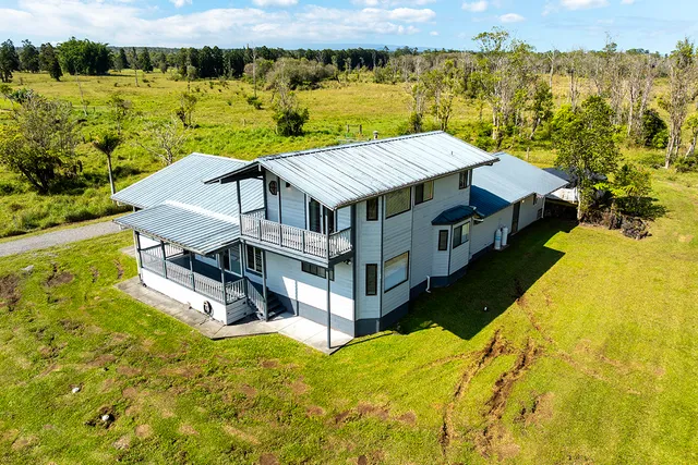 a view of a house with a ocean view