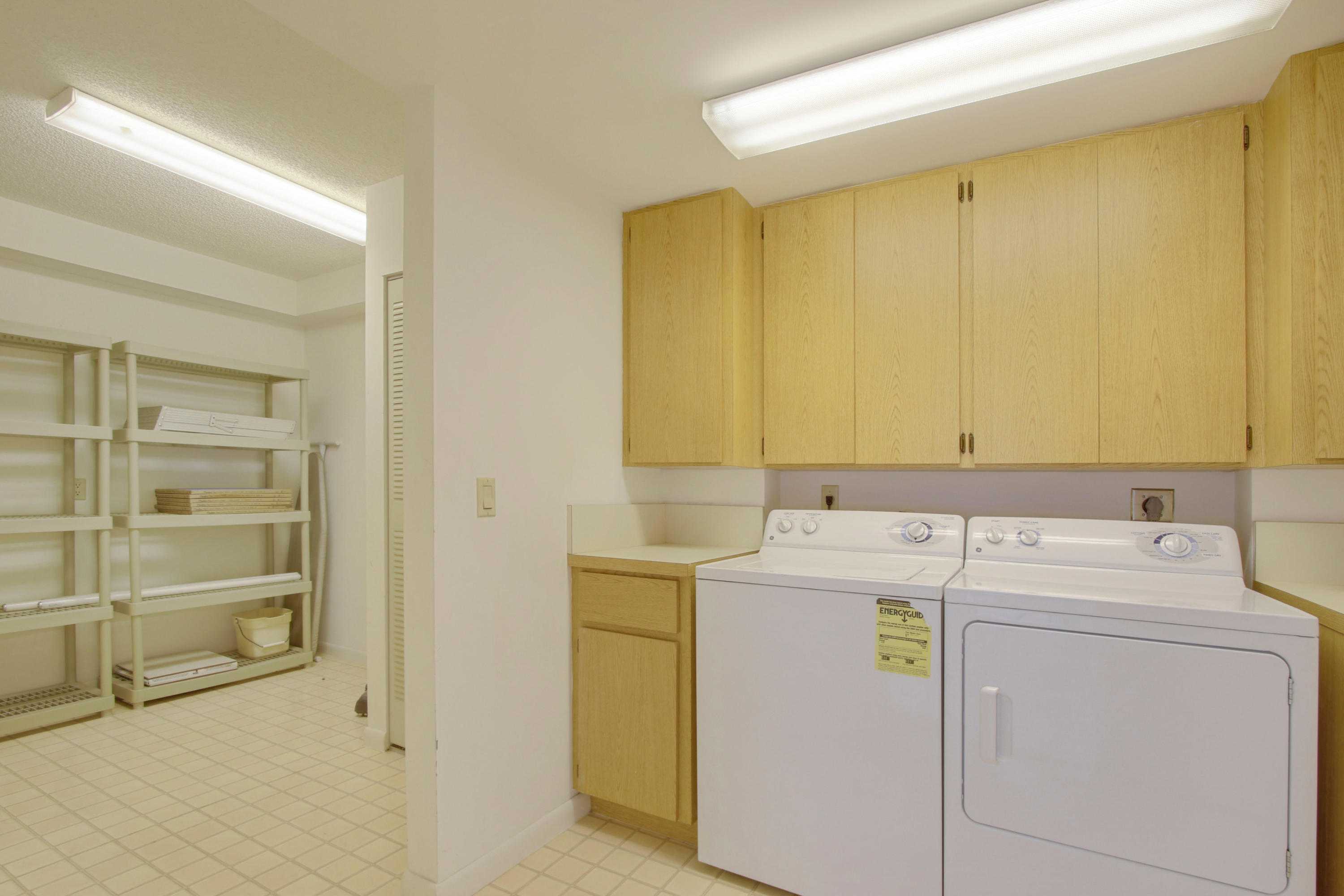 2401 Marina Isle Way, Unit 405 Jupiter, FL 33477 - Photo 25 of 36 Laundry Room with Extra Storage