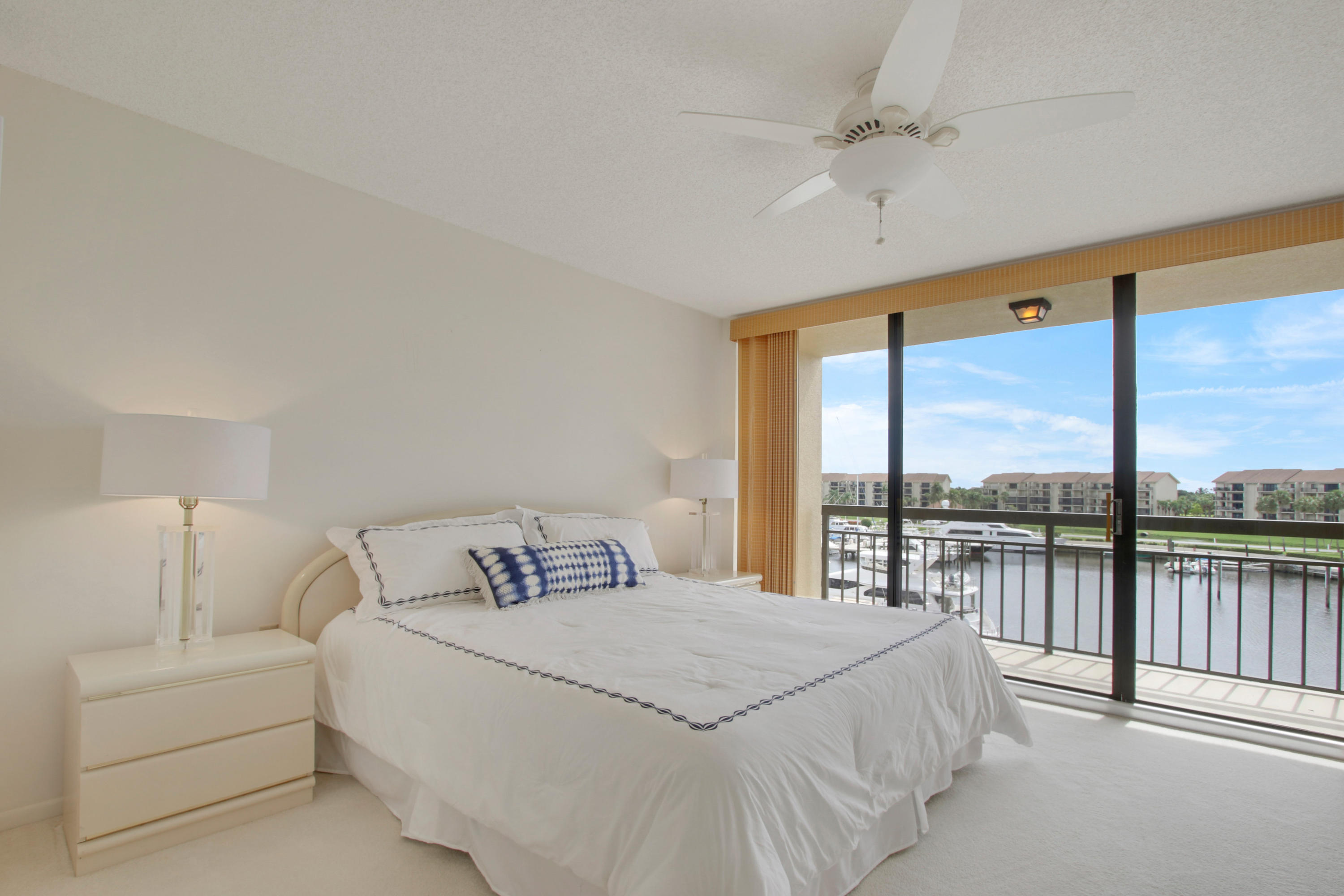 2401 Marina Isle Way, Unit 405 Jupiter, FL 33477 - Photo 4 of 36 Master Bedroom
