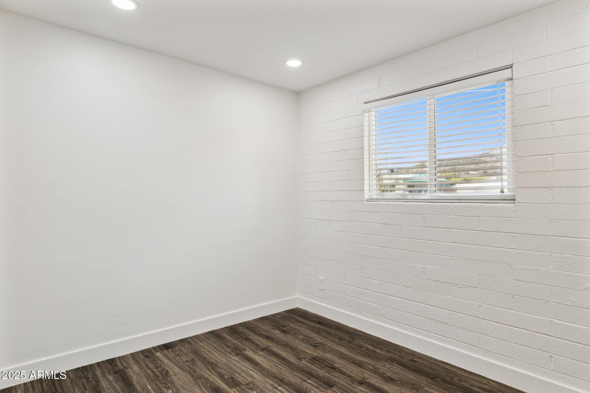 1542 East Turquoise Avenue, Unit 1 Phoenix, AZ 85020 - Photo 18 of 25 a view of empty room with window