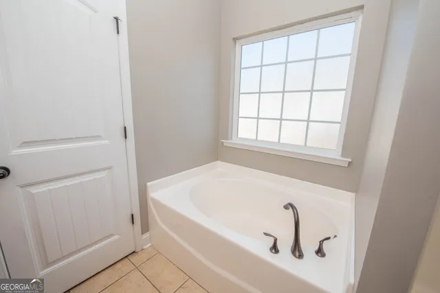 a view of a small space with racks on the wall