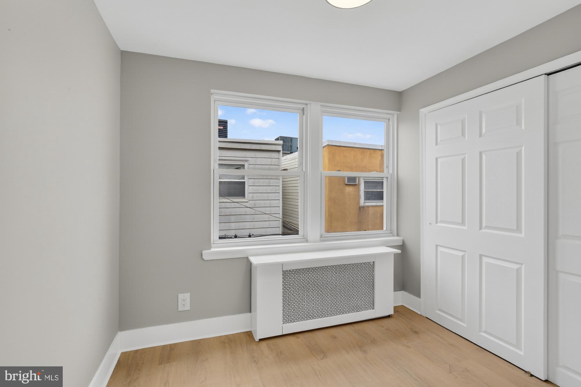 1908 South Jessup Street Philadelphia, PA 19148 - Photo 14 of 28 a view of empty room with window and fireplace