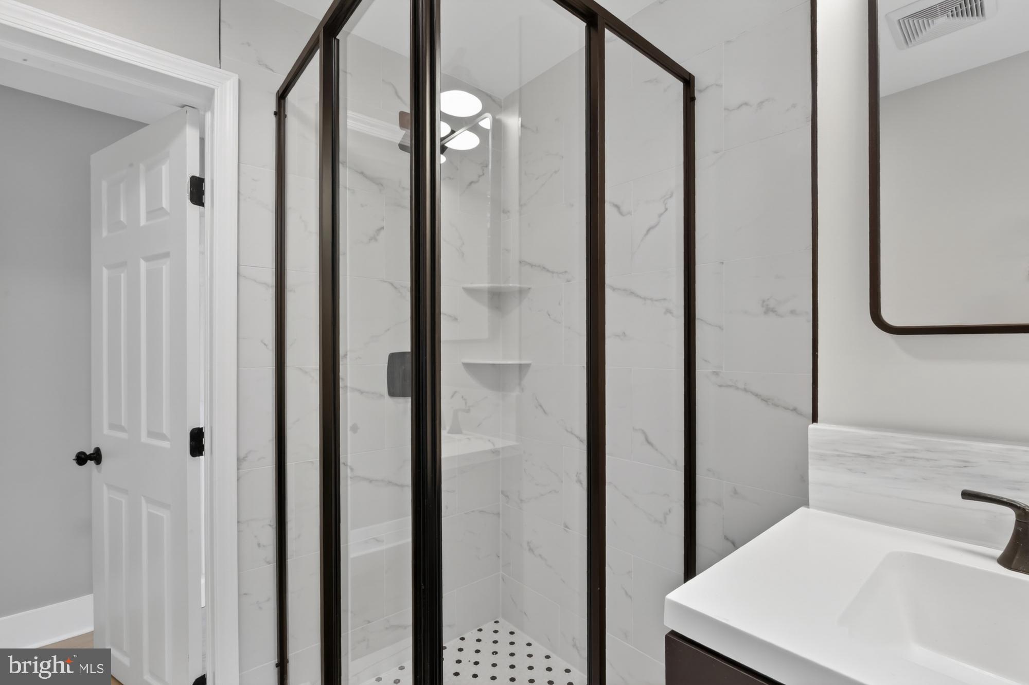 1908 South Jessup Street Philadelphia, PA 19148 - Photo 18 of 28 a bathroom with a shower and a sink