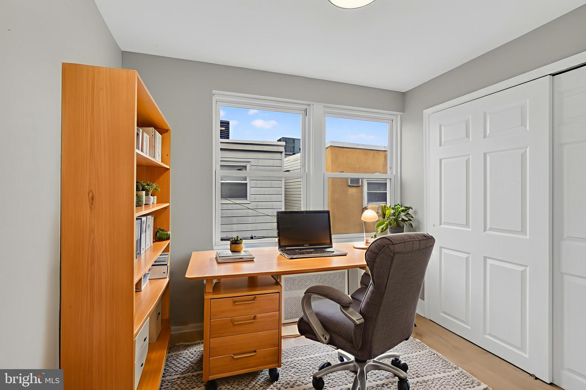 1908 South Jessup Street Philadelphia, PA 19148 - Photo 2 of 28 a view of a workspace with furniture and a window