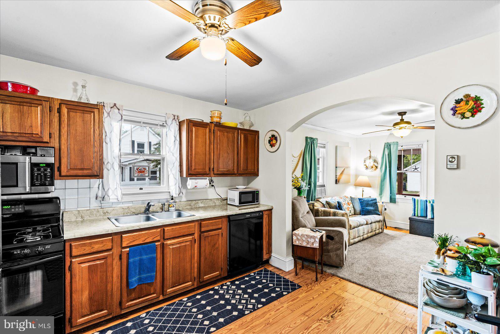 314 Lafayette Street Colonial Beach, VA 22443 - Photo 12 of 41 a kitchen with a sink appliances and cabinets