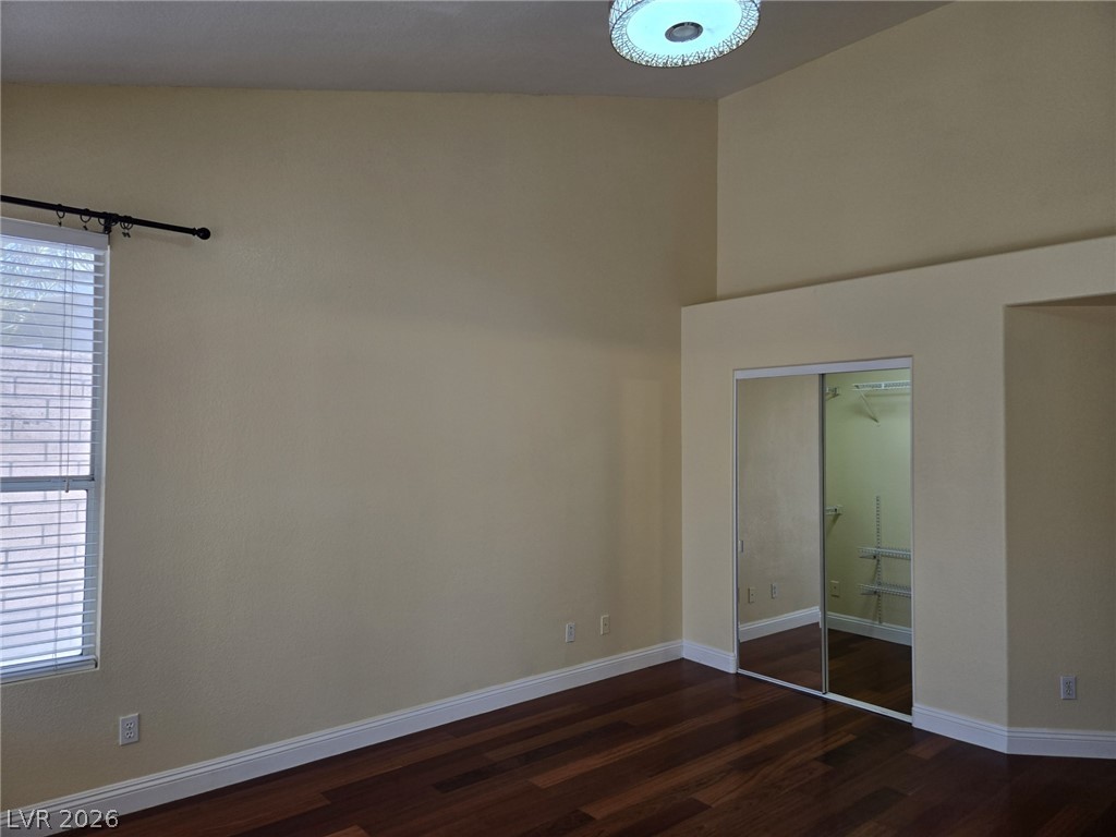 8417 San Ramon Drive Las Vegas, NV 89147 - Photo 25 of 33 Rich hardwood floors complement neutral walls in this well-appointed living space.