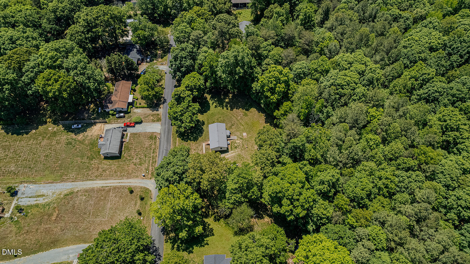 1302 Blacksmith Road Efland, NC 27243 - Photo 39 of 46 an aerial view of residential house with outdoor space and trees all around