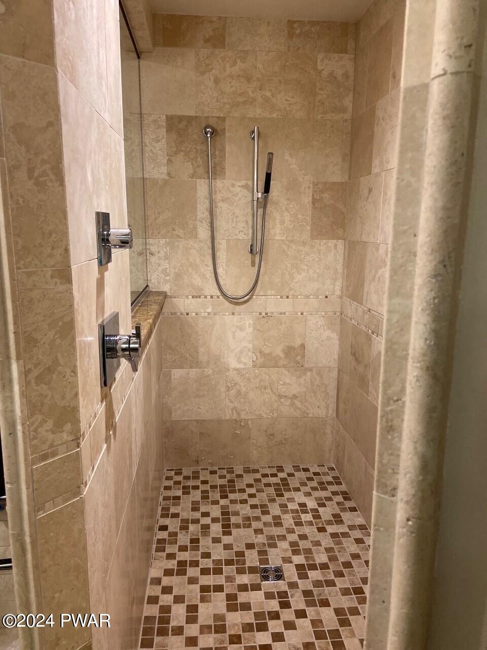 355 Summit Woods Road Moscow, PA 18444 - Photo 2 of 10 a bathroom with a shower