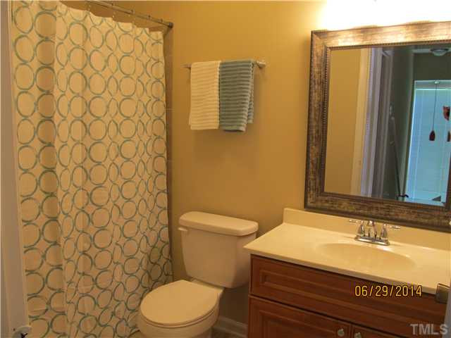 4253 Lake Ridge Drive Raleigh, NC 27604 - Photo 19 of 22 a bathroom with a sink and a toilet