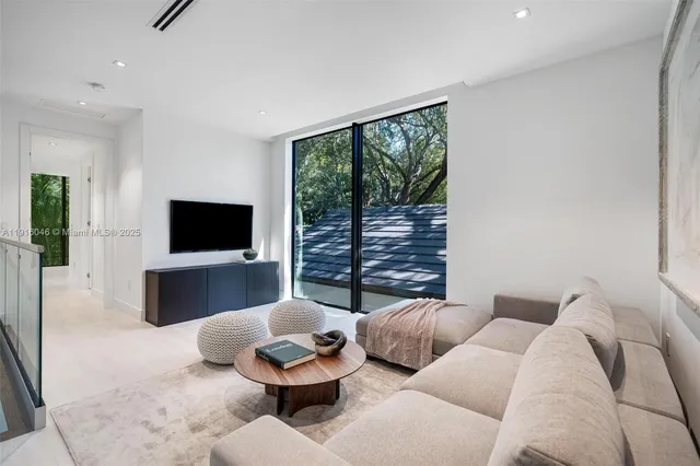 a view of a chair and table in the balcony