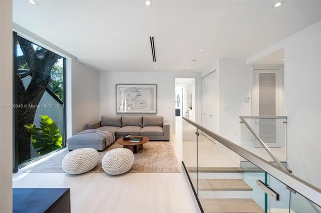 a view of a balcony with chairs