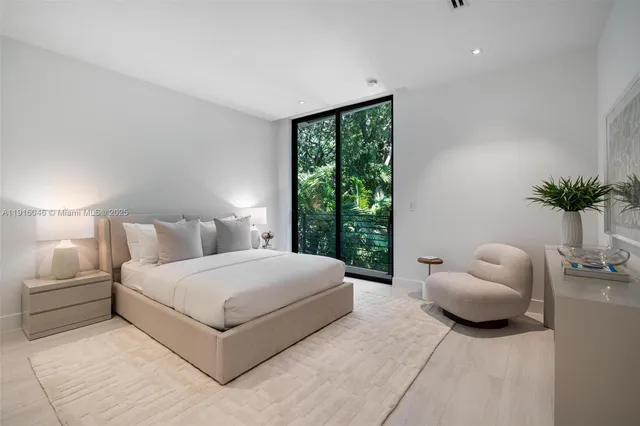 a view of a big room with yard from balcony