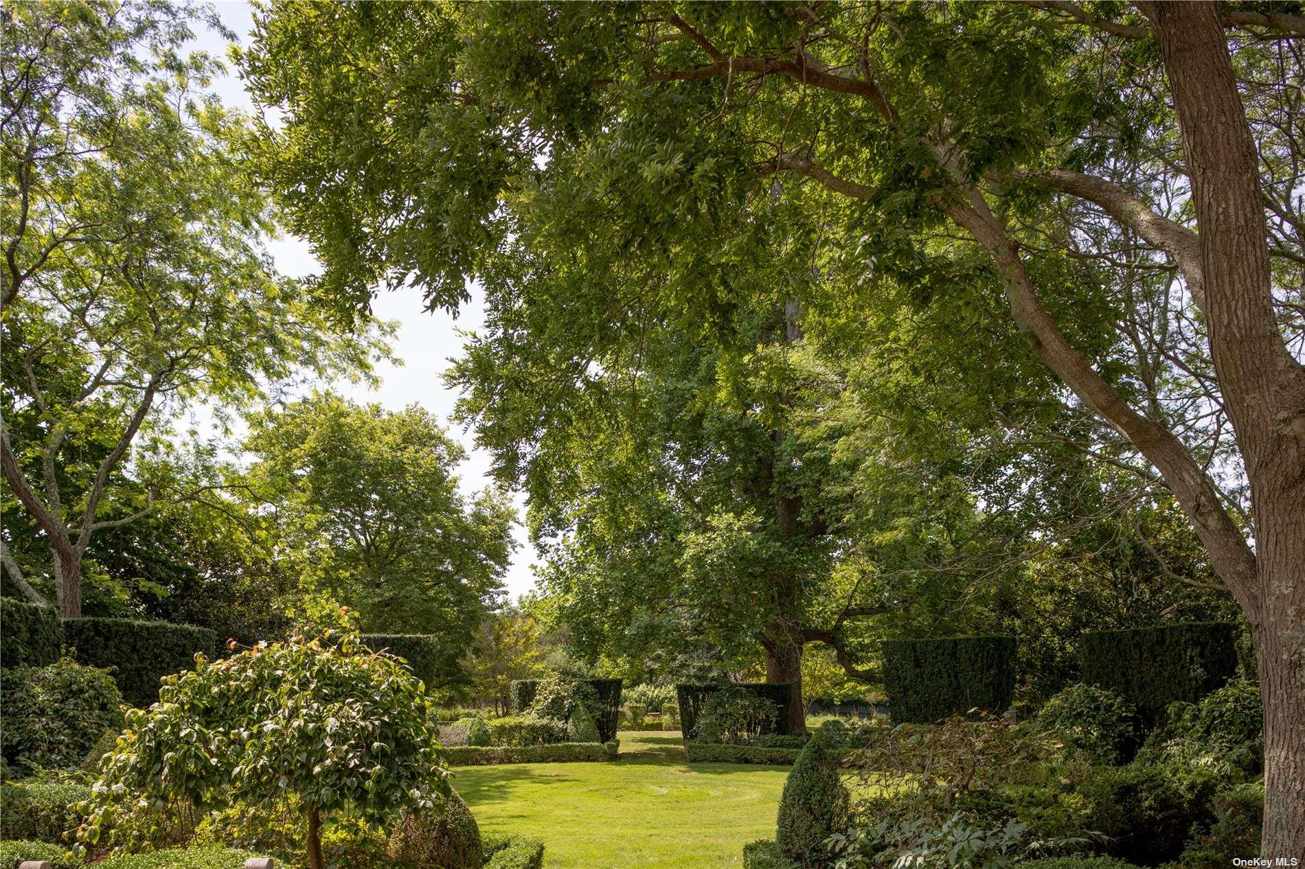 16 Tuthill Lane Remsenburg, NY 11960 - Photo 32 of 32 a view of a lake with houses