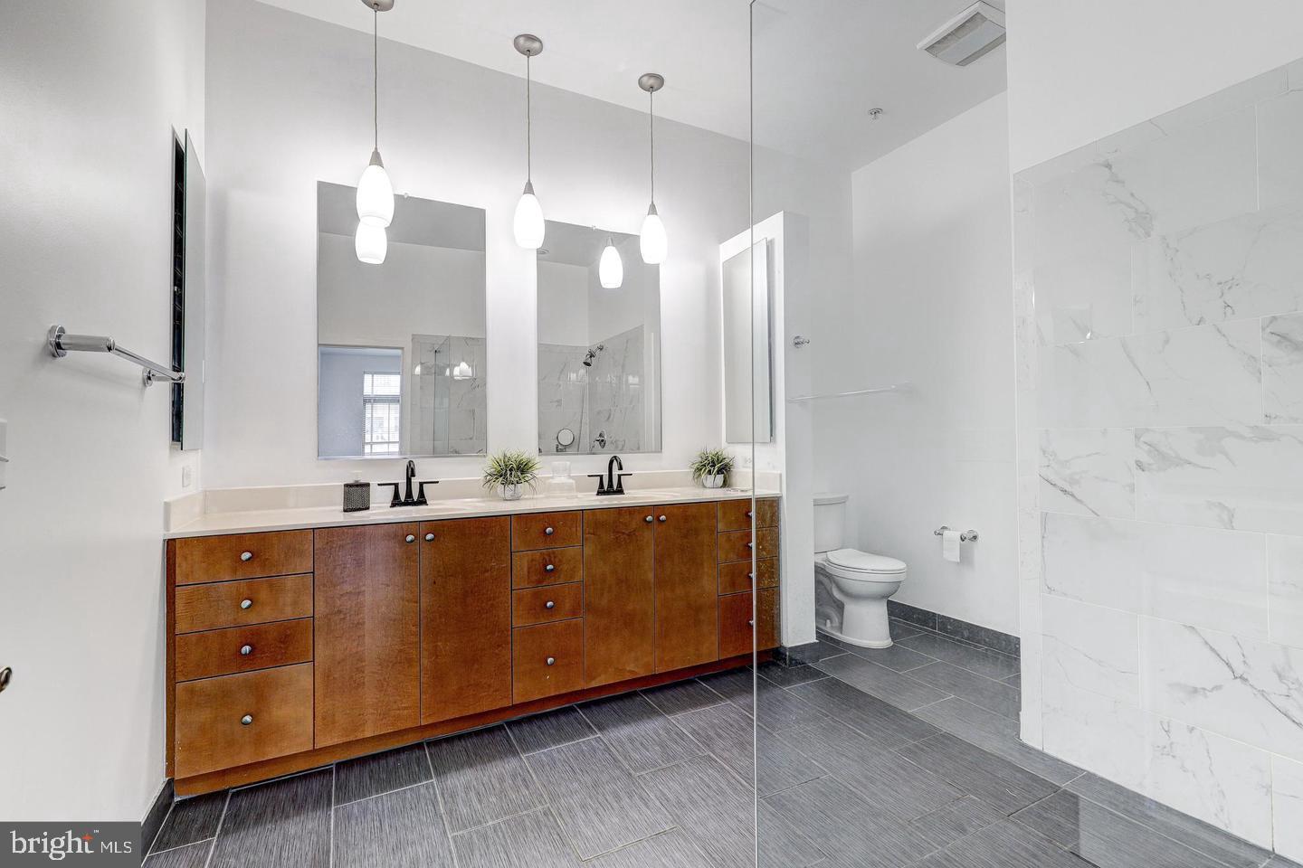 1209 North Charles Street, Unit 319 Baltimore, MD 21201 - Photo 13 of 34 Primary Bathroom.