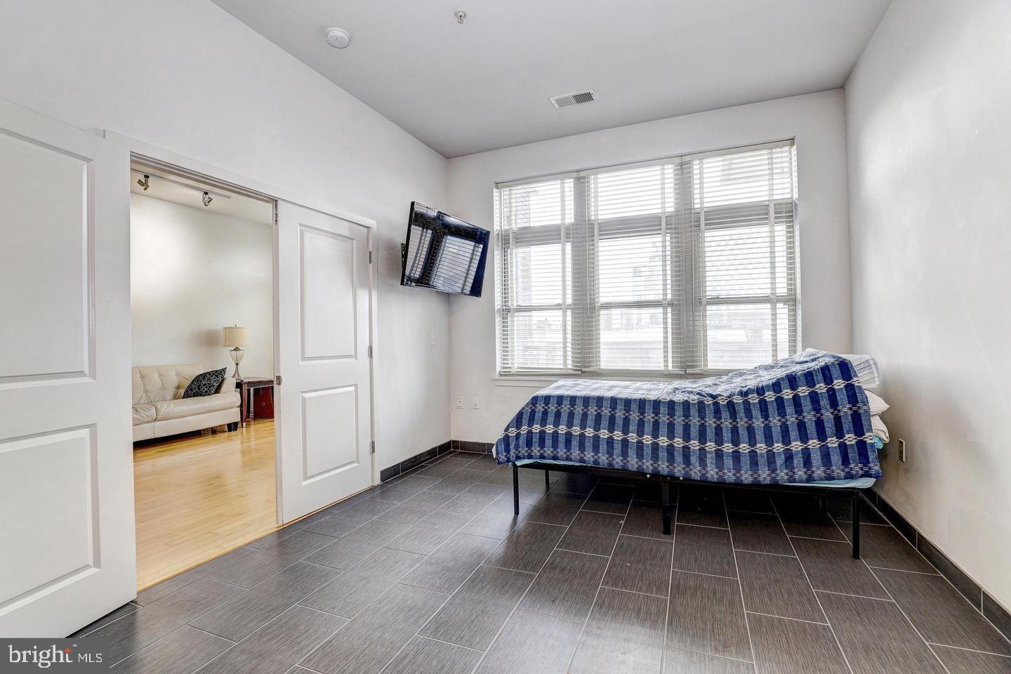 1209 North Charles Street, Unit 319 Baltimore, MD 21201 - Photo 17 of 34 Second Bedroom.