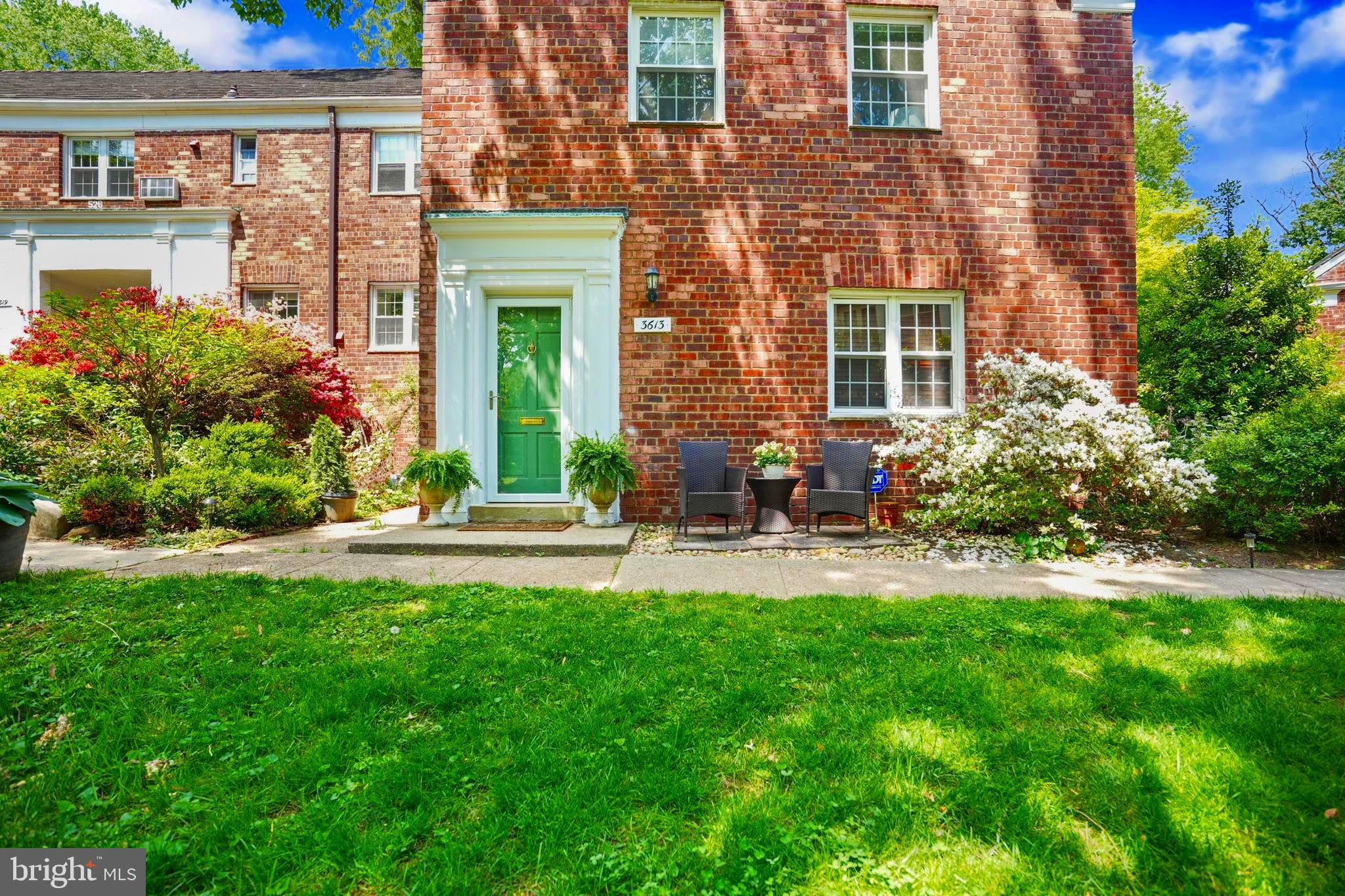 3613 Gunston Road Alexandria, VA 22302 - Photo 3 of 20 a front view of a house with a yard and potted plants