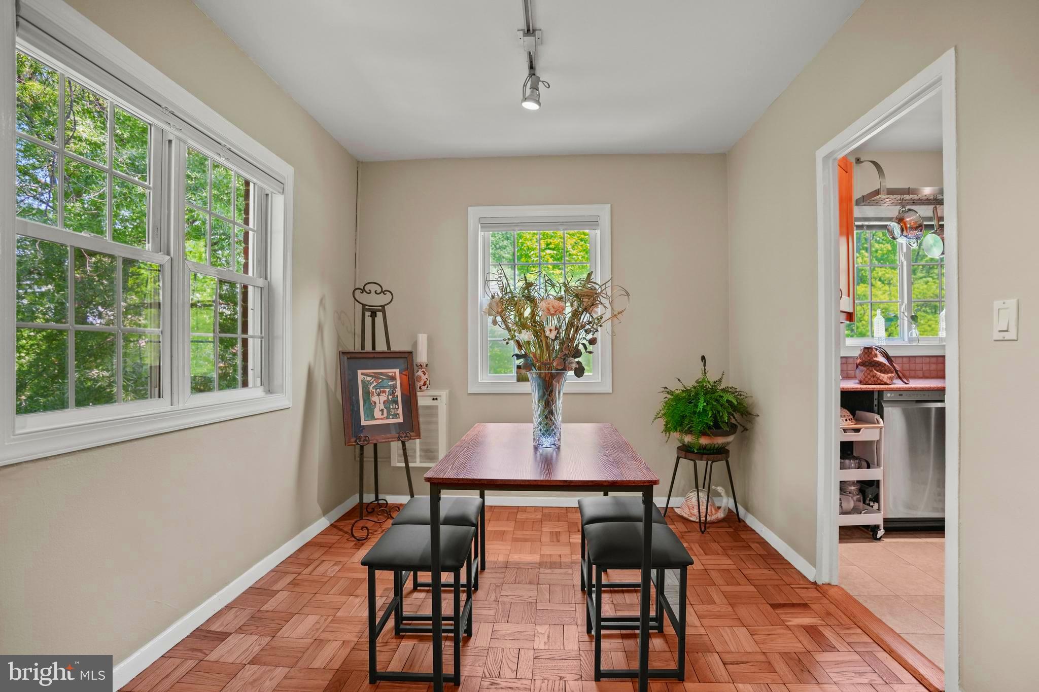 3613 Gunston Road Alexandria, VA 22302 - Photo 7 of 20 a view of a dining room with furniture window and wooden floor
