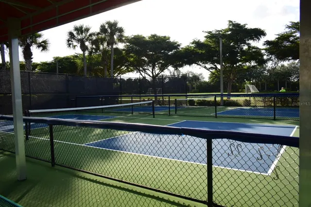 a view of park with deck and a garden