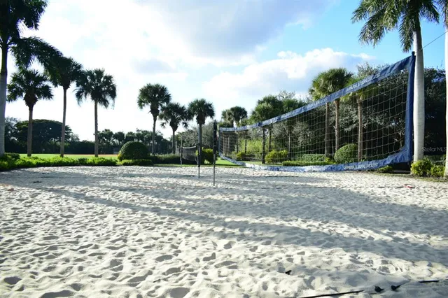 a view of a yard with a basketball court