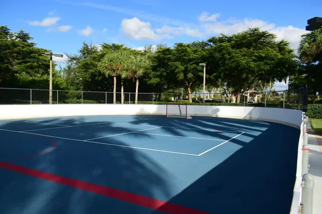 a view of an outdoor space and tennis court