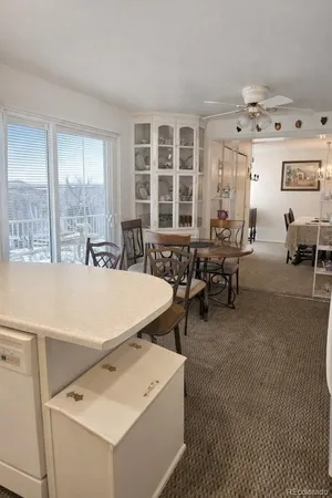 a living room with furniture and window