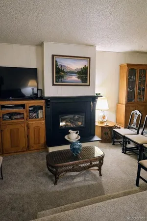 a bathroom with a sink toilet and a mirror