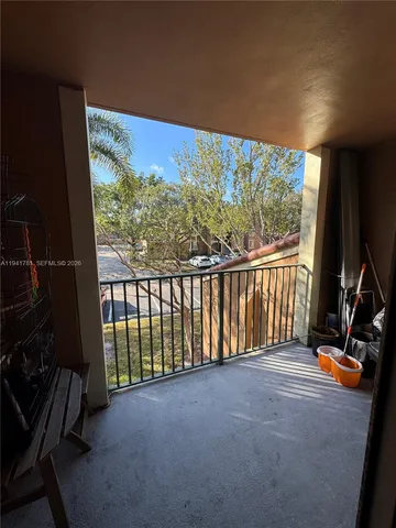 a view of a porch with a tv