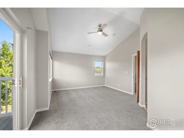 a view of a lake with a house in the background