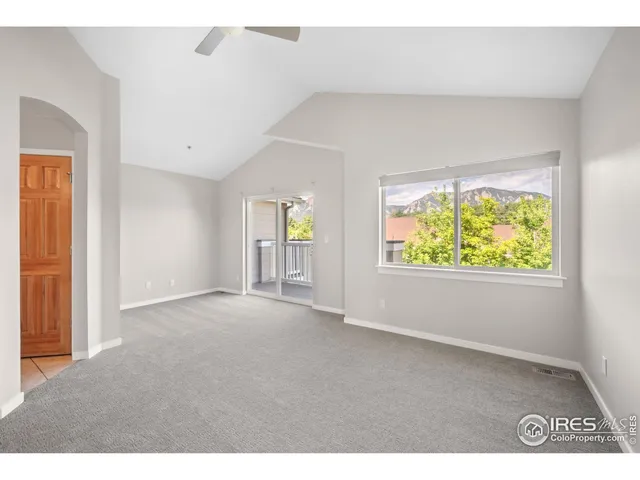 a view of balcony with wooden floor
