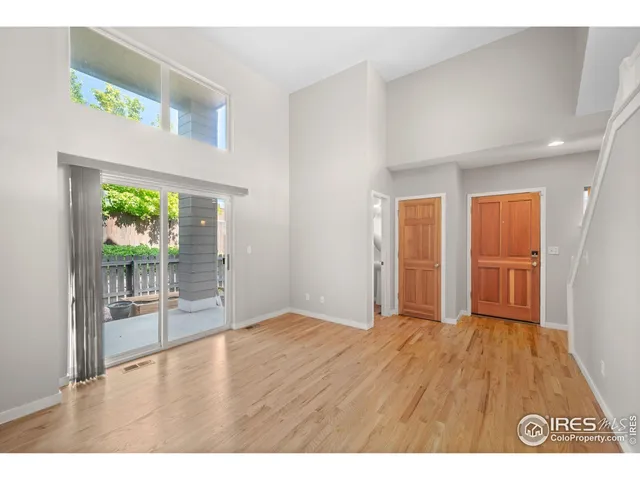 a view of a kitchen with a sink cabinets and a fireplace