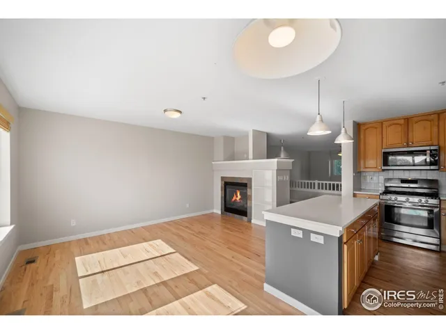 a view of a balcony with wooden floor