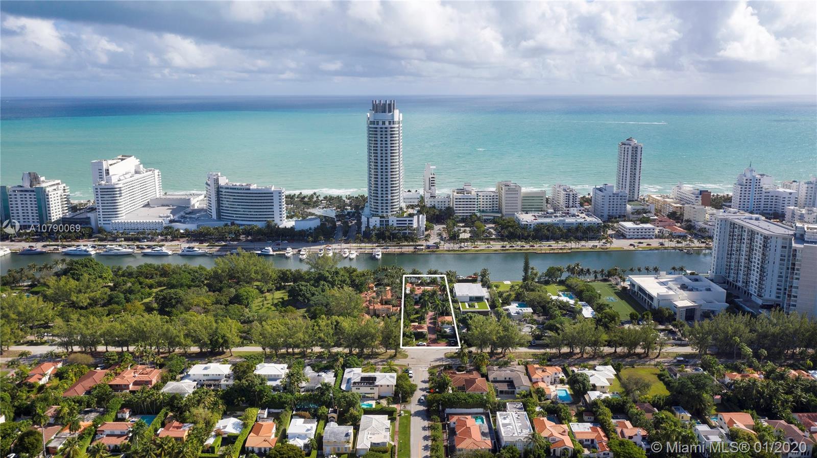 4403 Pine Tree Drive Miami Beach, FL 33140 - Photo 12 of 12 a view of a city with tall buildings