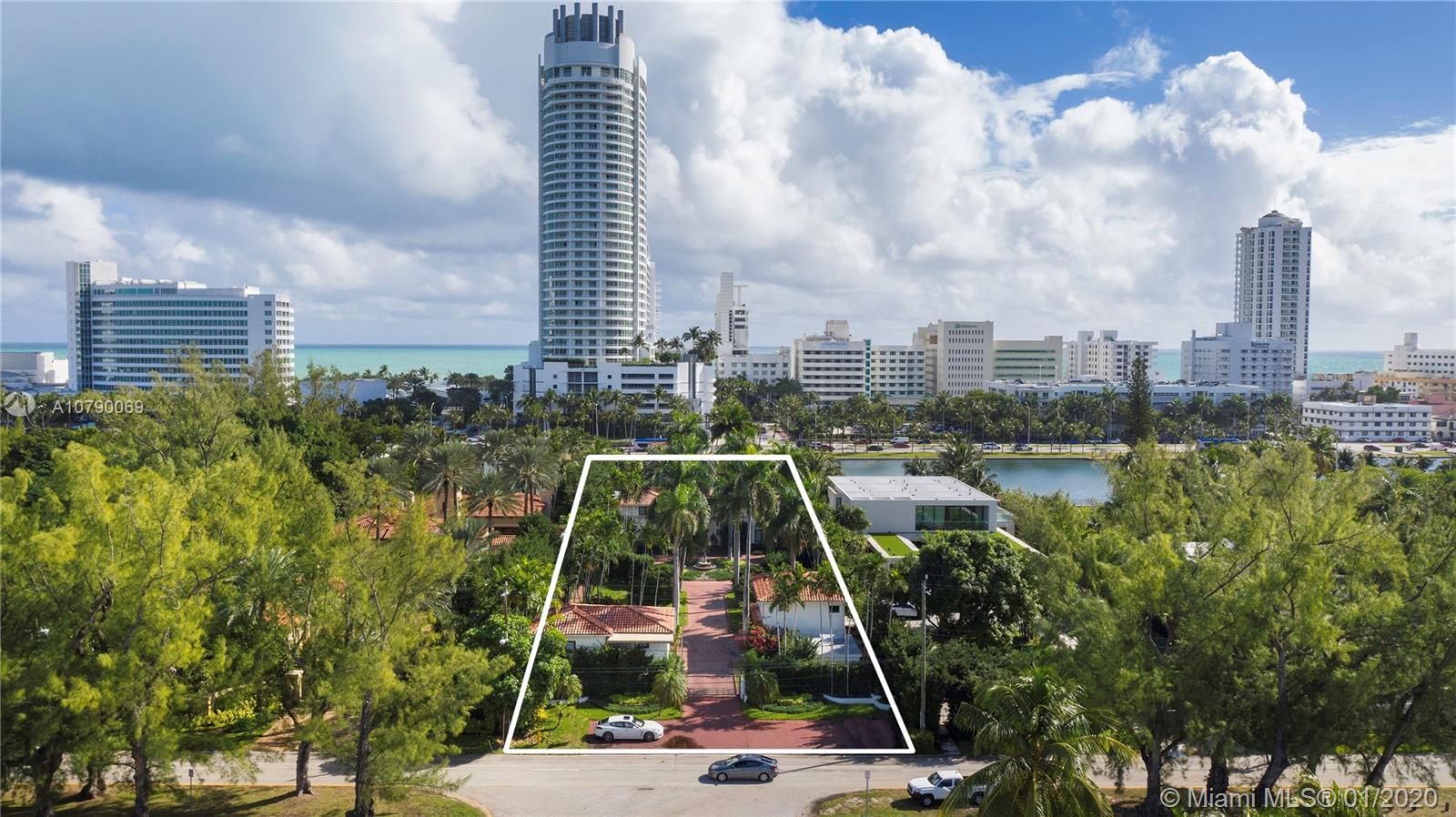 4403 Pine Tree Drive Miami Beach, FL 33140 - Photo 6 of 12 a view of a city with tall buildings