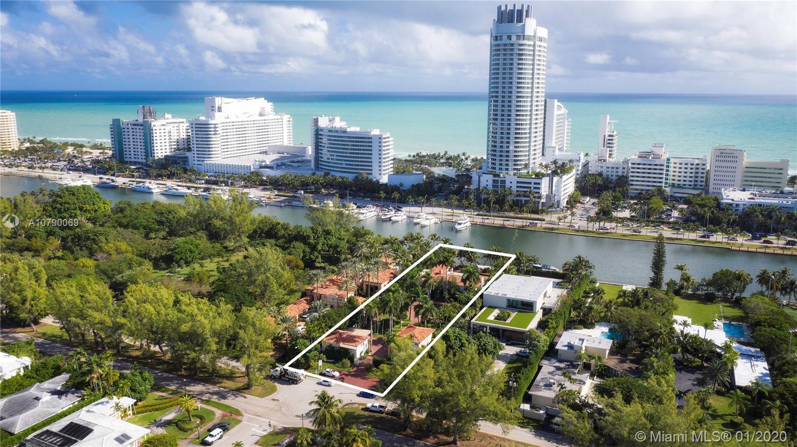 4403 Pine Tree Drive Miami Beach, FL 33140 - Photo 10 of 12 a view of a city with tall buildings