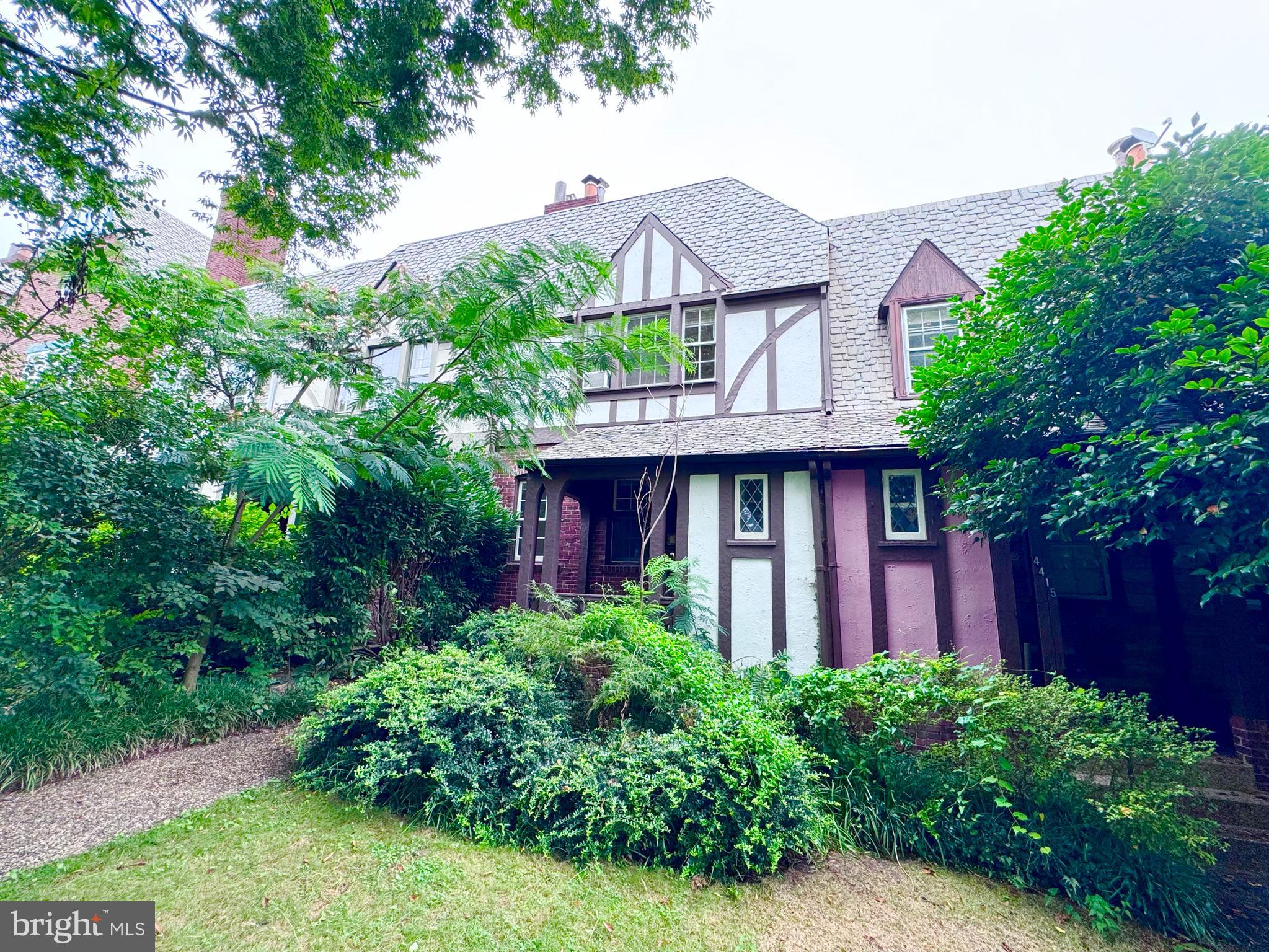 4417 Volta Place Northwest Washington, DC 20007 - Photo 1 of 38 a front view of a house with garden