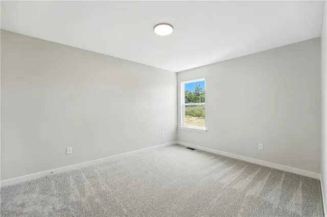 $384,950 | 709 Glenn Circle, Raymore, MO 64083