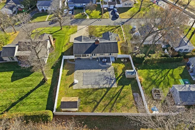 a view of swimming pool with a yard and sitting area